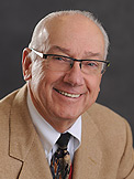 J. Comcowich, PhD