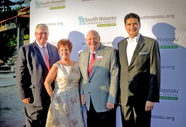 Richard J. Murphy, president and CEO of South Nassau; Lori Edelman, RN; Joseph Fennessy, Chairman of South Nassau’s Board of Directors and Rajiv Datta, MD.